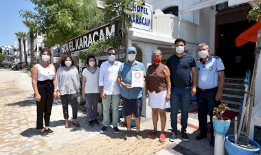 FOÇA’DA İKİ İŞLETMEYE TURUNCU ÇEMBER
