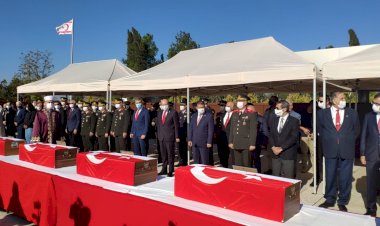Kıbrıs'ta 46 yıl önce katledilen 14 çocuk toprağa verildi