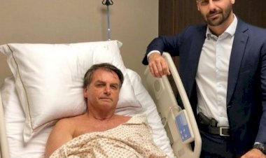 Bolsonaro’nun oğlu hastanede silahla poz verdi